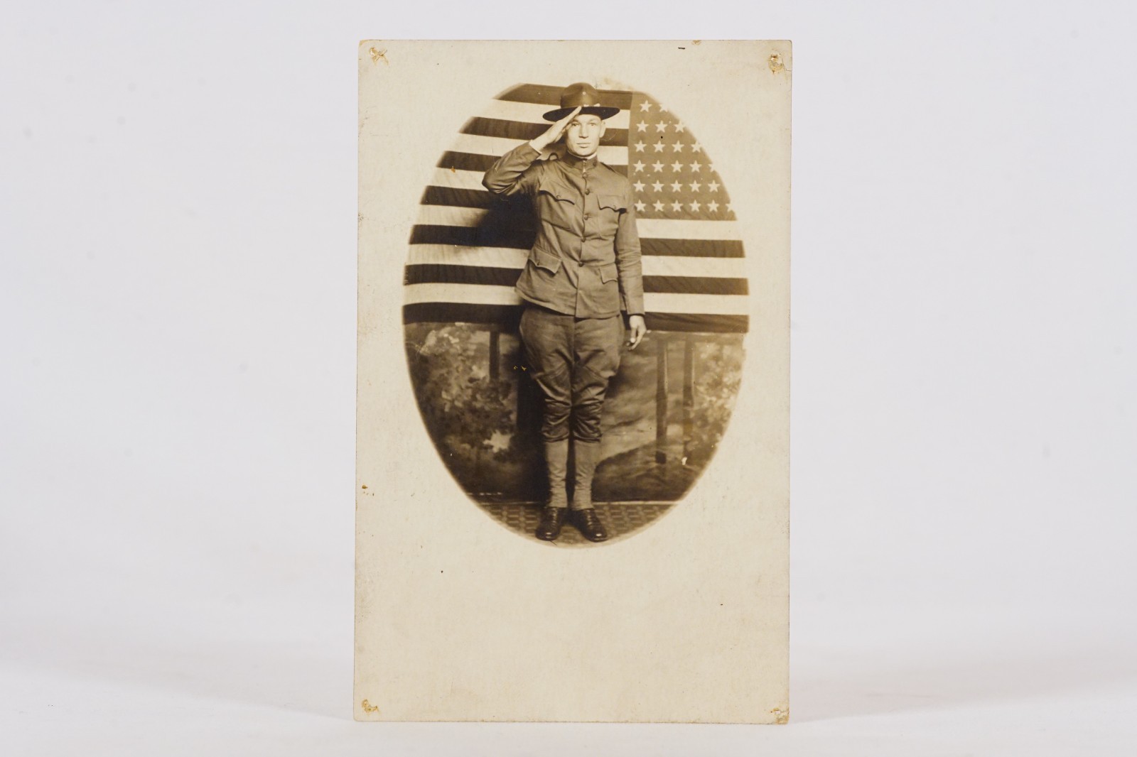 Photo WWI US Army Soldier Doughboy Saluting US Flag RPPC Postcard