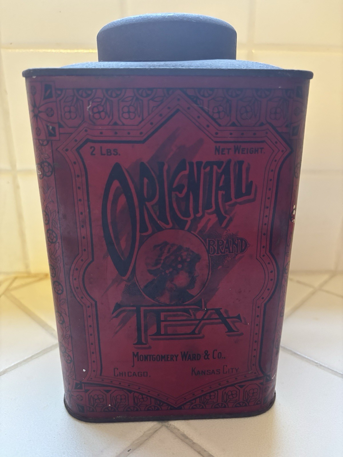 Antique  Montgomery Ward & Co Oriental Brand tea Tin 2 lbs Girl Design