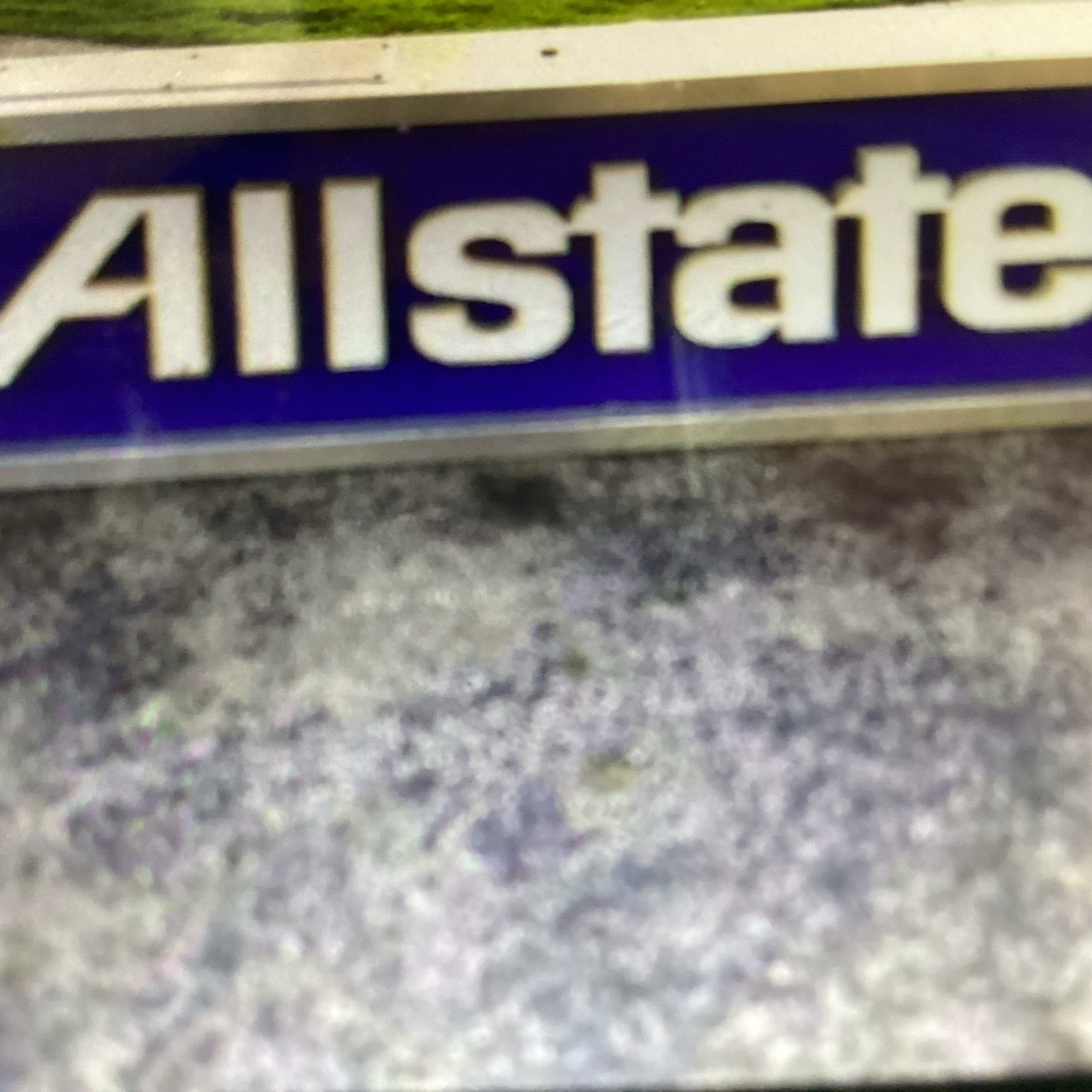 Vintage Allstate Light Up Can Sign Hung On Side Of Building 