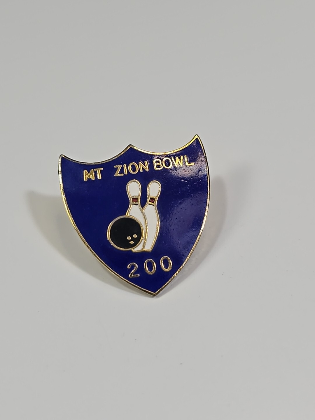 Mt Zion Bowl 200 Lapel Pin Blue Background Shield Shape 