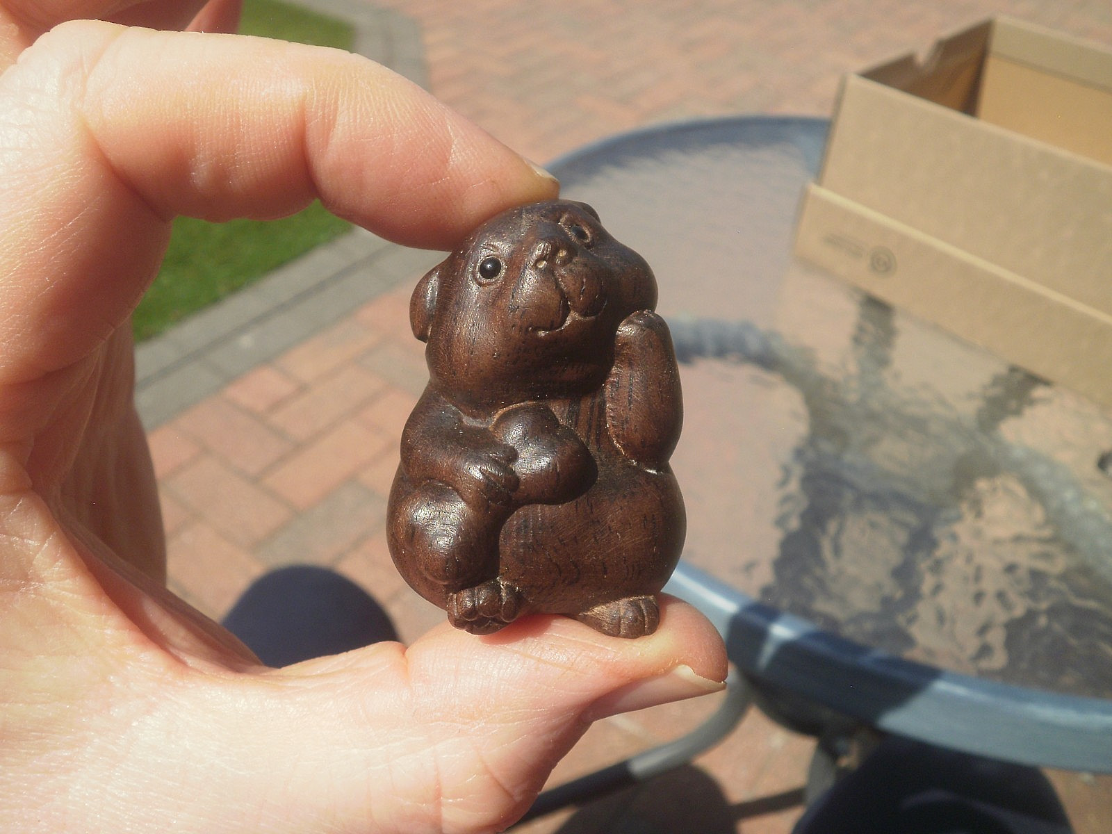 Carved wood netsuke cute dog holding his toy wooden collectable carving netski Carved wood netsuke cute dog holding his toy wooden collectable carving netski