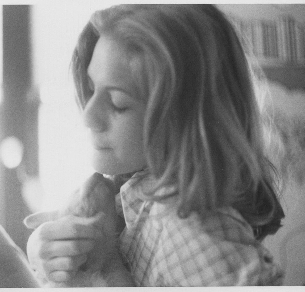 1980s Pretty Woman Holding Pet Cat Affection Closeup Portrait Cozy Home
