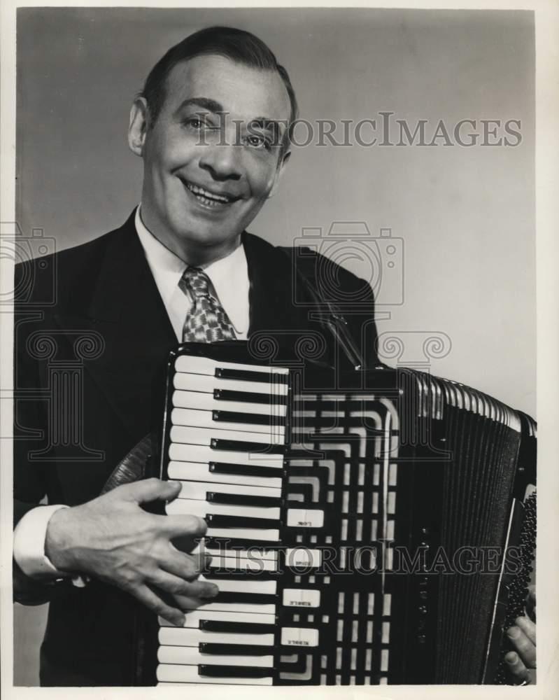 1951 Press Photo Phil Baker Plays His Accordion On 