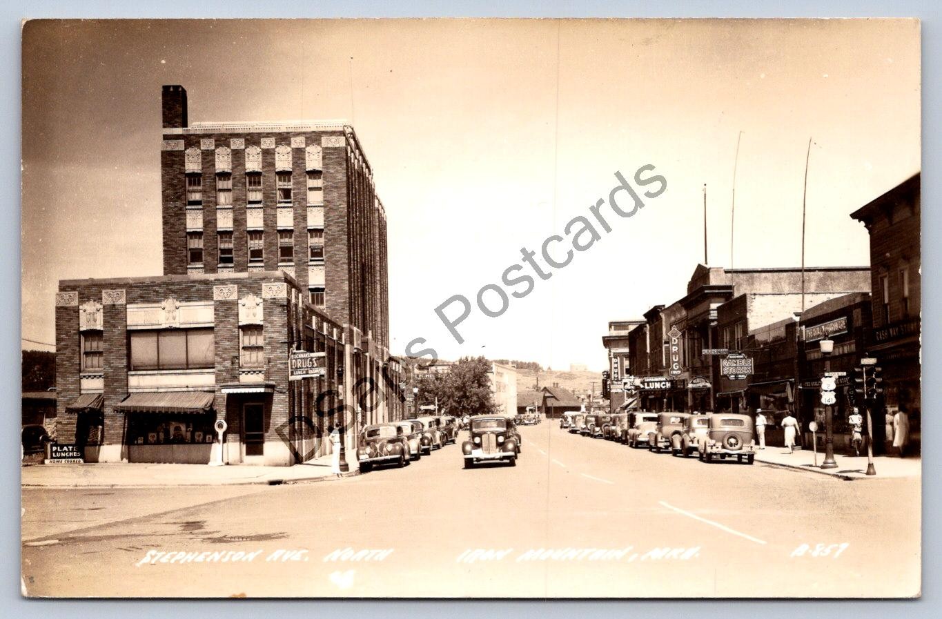 K65/ Iron Mountain Michigan RPPC Postcard c1950s Stephenson Avenue 109