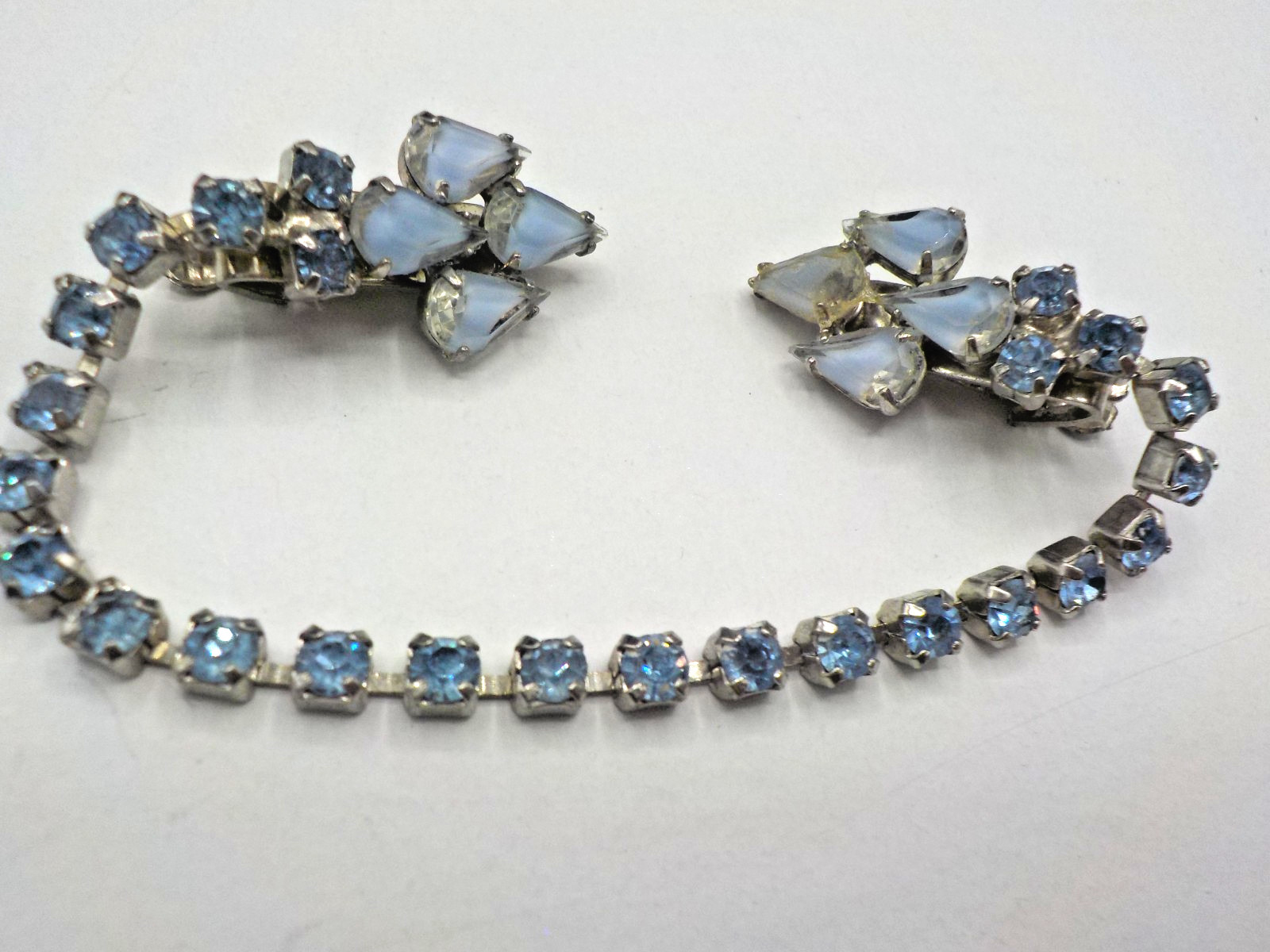 Vintage Estate sweater clip 8 inches long Silvertone light blue Rhinestones