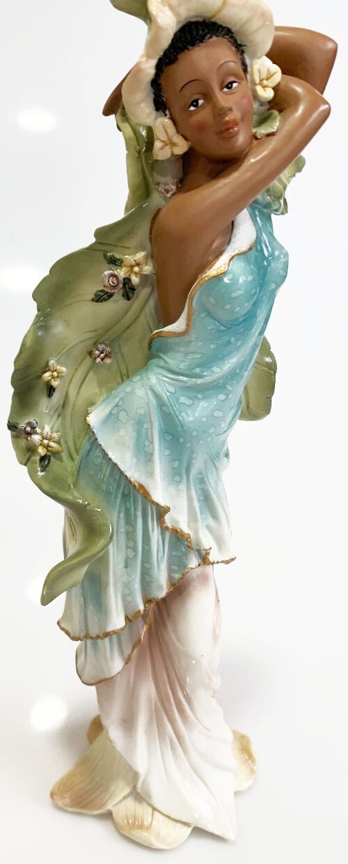 YOUNG AFRICAN AMERICAN WOMEN IN BLUE VINTAGE FIGURINE WITH LARGE LEAVES 12\