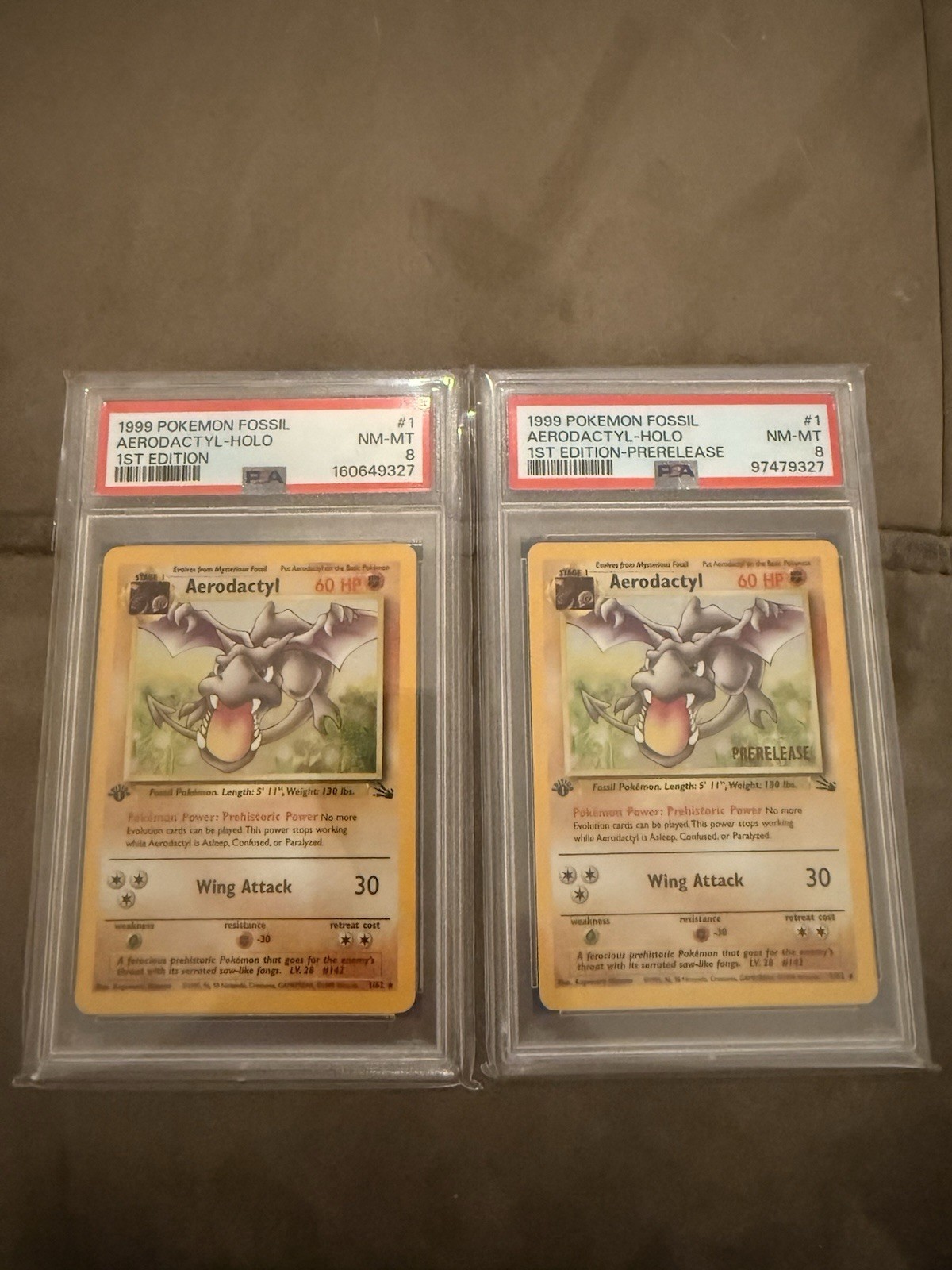 Pokémon TCG Fossil Aerodactyl 1st Edition PSA 8 And Pre Release PSA 8