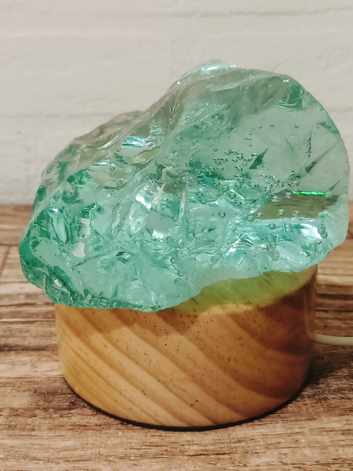 590 Grams Soft Green Monatomic Andara Crystal with Wood Base Dimmer G10