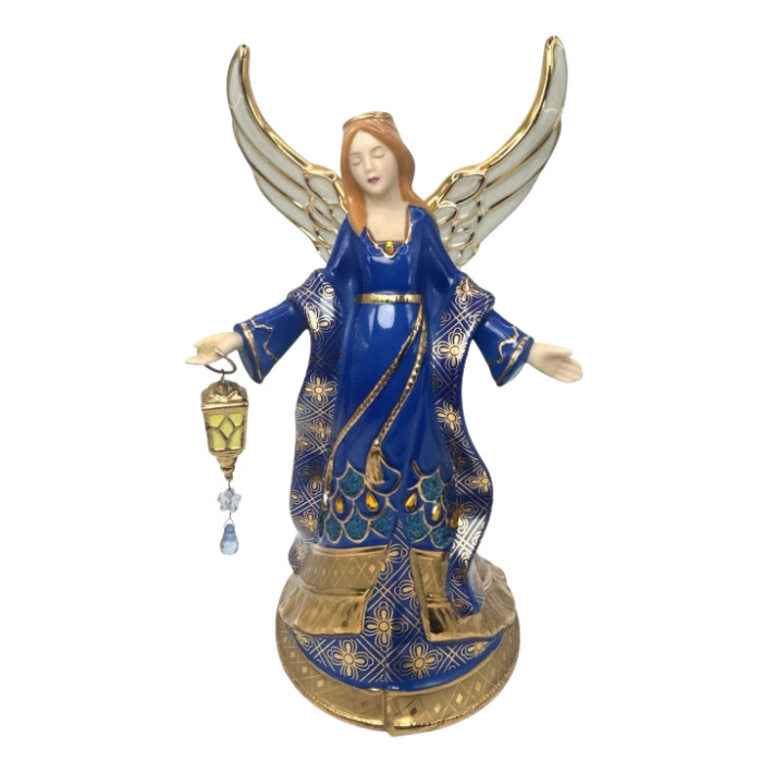 Bradford Editions Angel of Light figurine music box \'Wind Beneath My Wings\' 