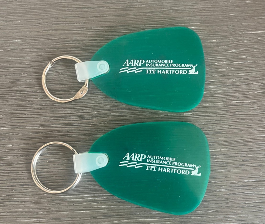 (2) Vintage AARP  ITT Hartford Green Rubber Keychains