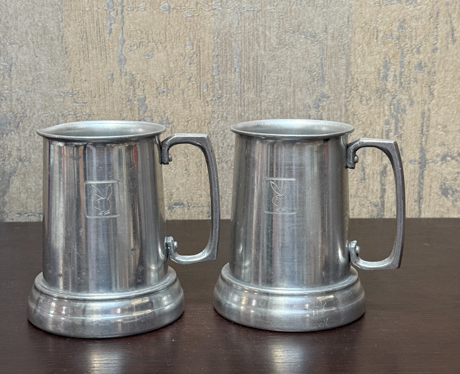 Vintage 1970’s Playboy Club Aluminum Metal Glass Bottom Beer Stein Mug Set of 2 Vintage 1970’s Playboy Club Aluminum Metal Glass Bottom Beer Stein Mug Set of 2