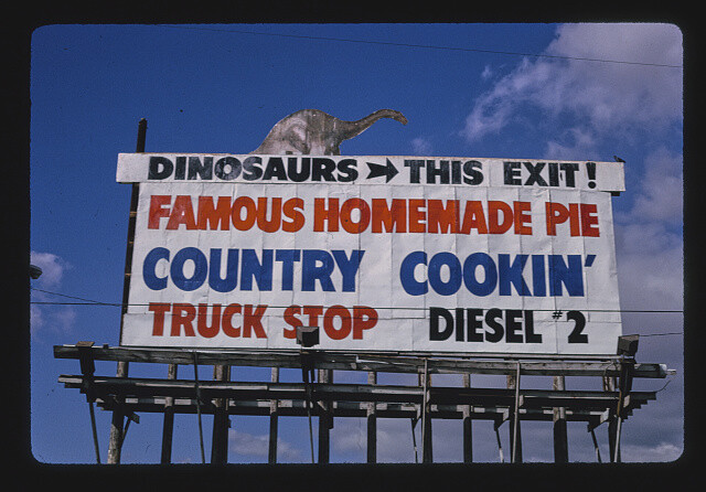 Wheel in mini Mart sign 24 Hour Art Show Cabazon California 1980s Old Photo