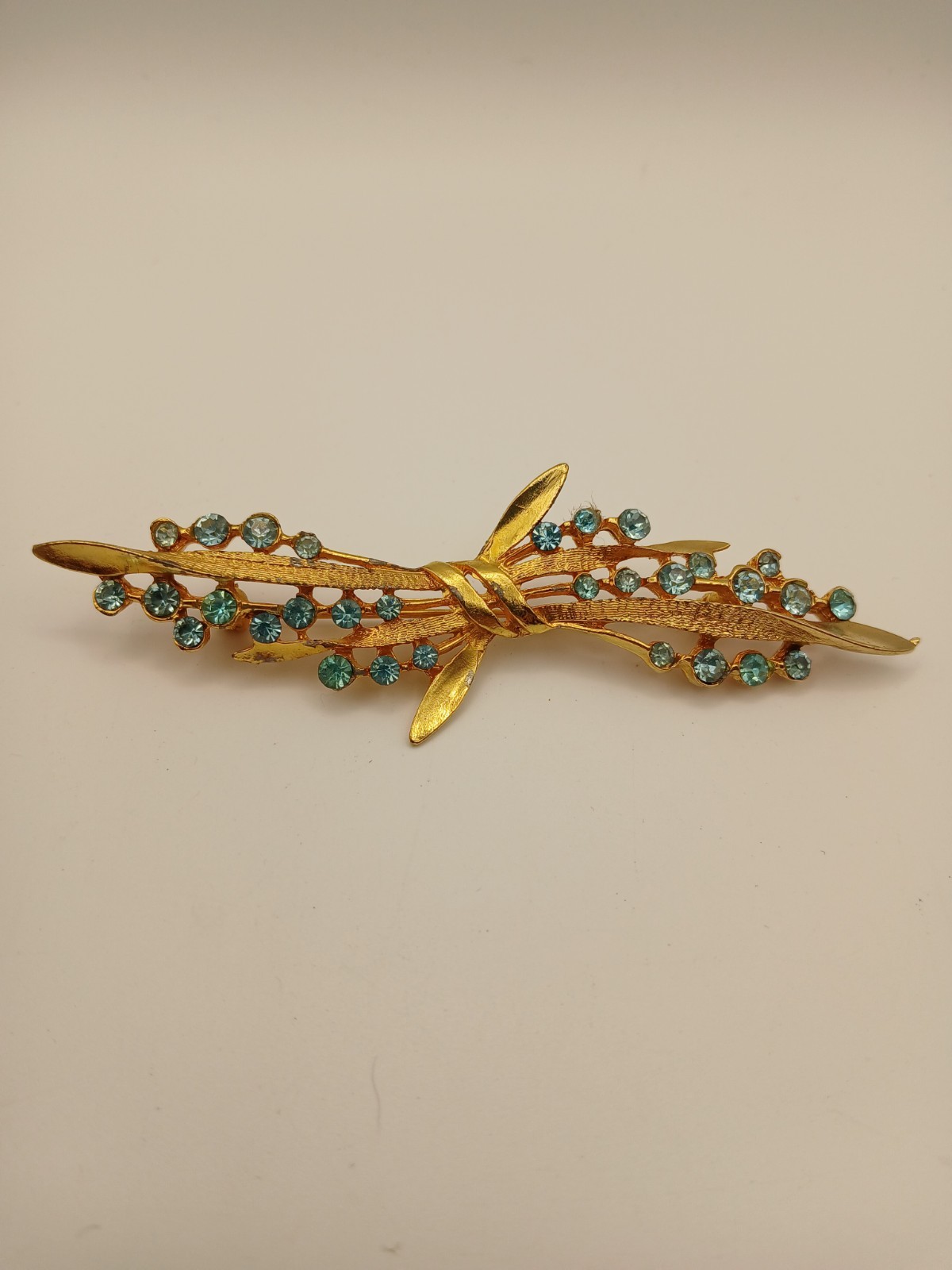 vintage Dodds gold tone brooch pin with blue/aqua/turquoise rhinestones vintage Dodds gold tone brooch pin with blue/aqua/turquoise rhinestones