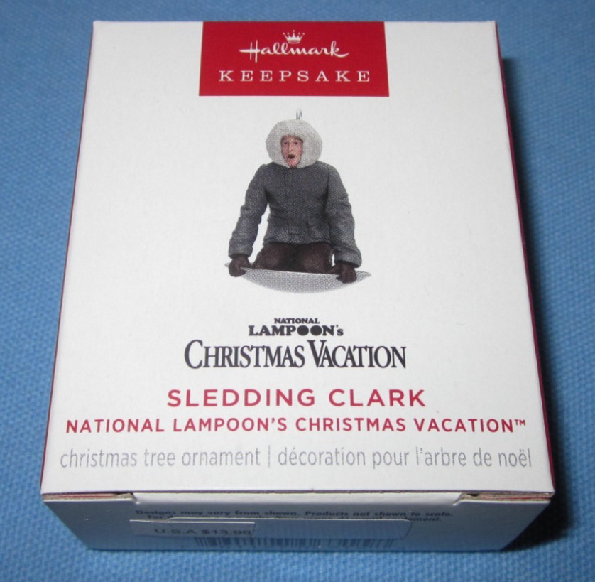 a 2025 Hallmark Miniature Ornament ~ Christmas Vacation, Sledding Clark
