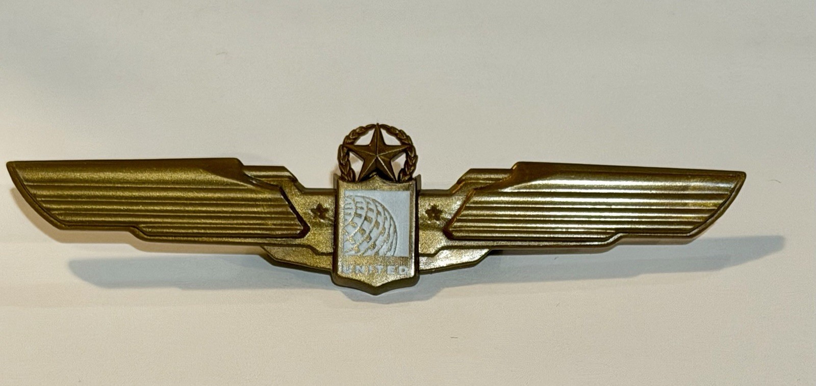 Vintage United Airlines Pilot Wings Pin, plastic, 3-3/8 inches