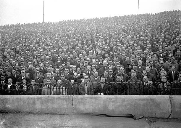 Football Section of the 53,703 crowd during the two minutes silenc- Old Photo