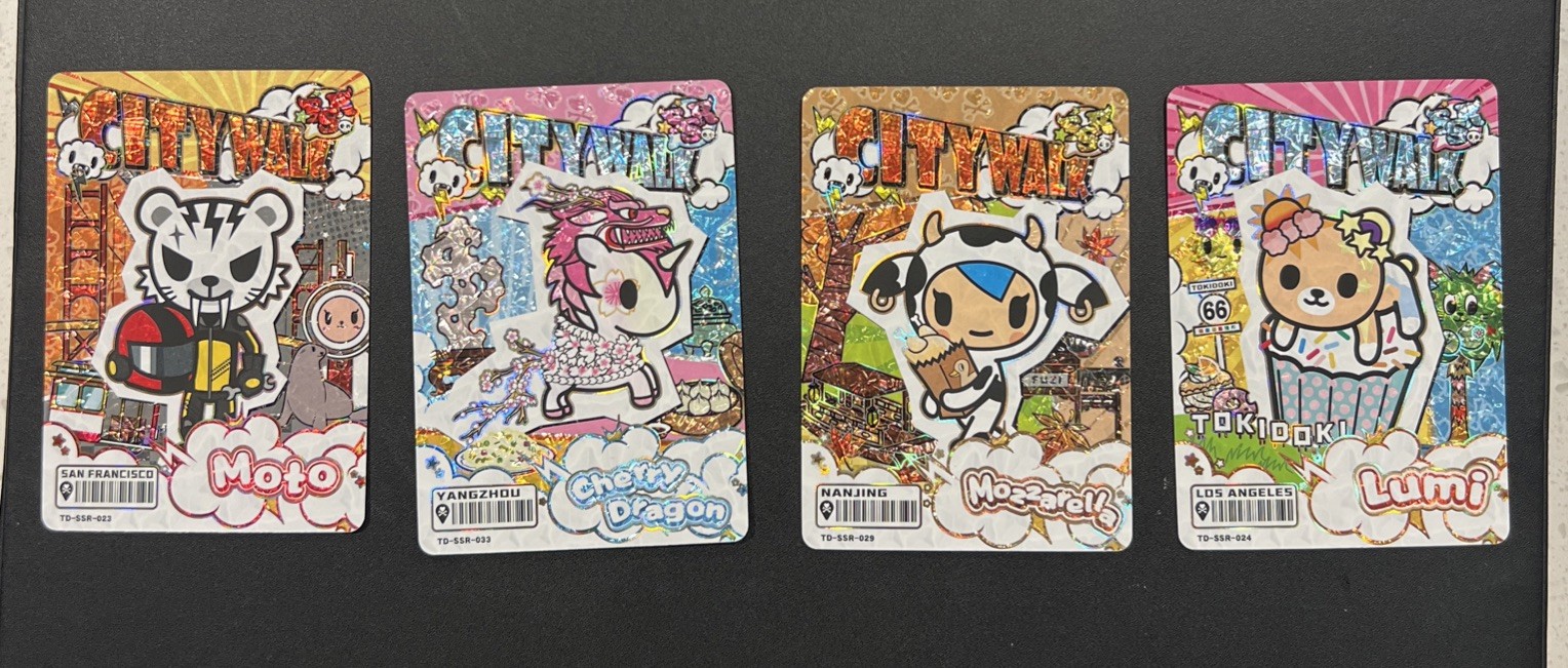 Tokidoki Wonder Voyage Series 2 City Walk SSR lot of 4. Tokidoki Wonder Voyage Series 2 City Walk SSR lot of 4.