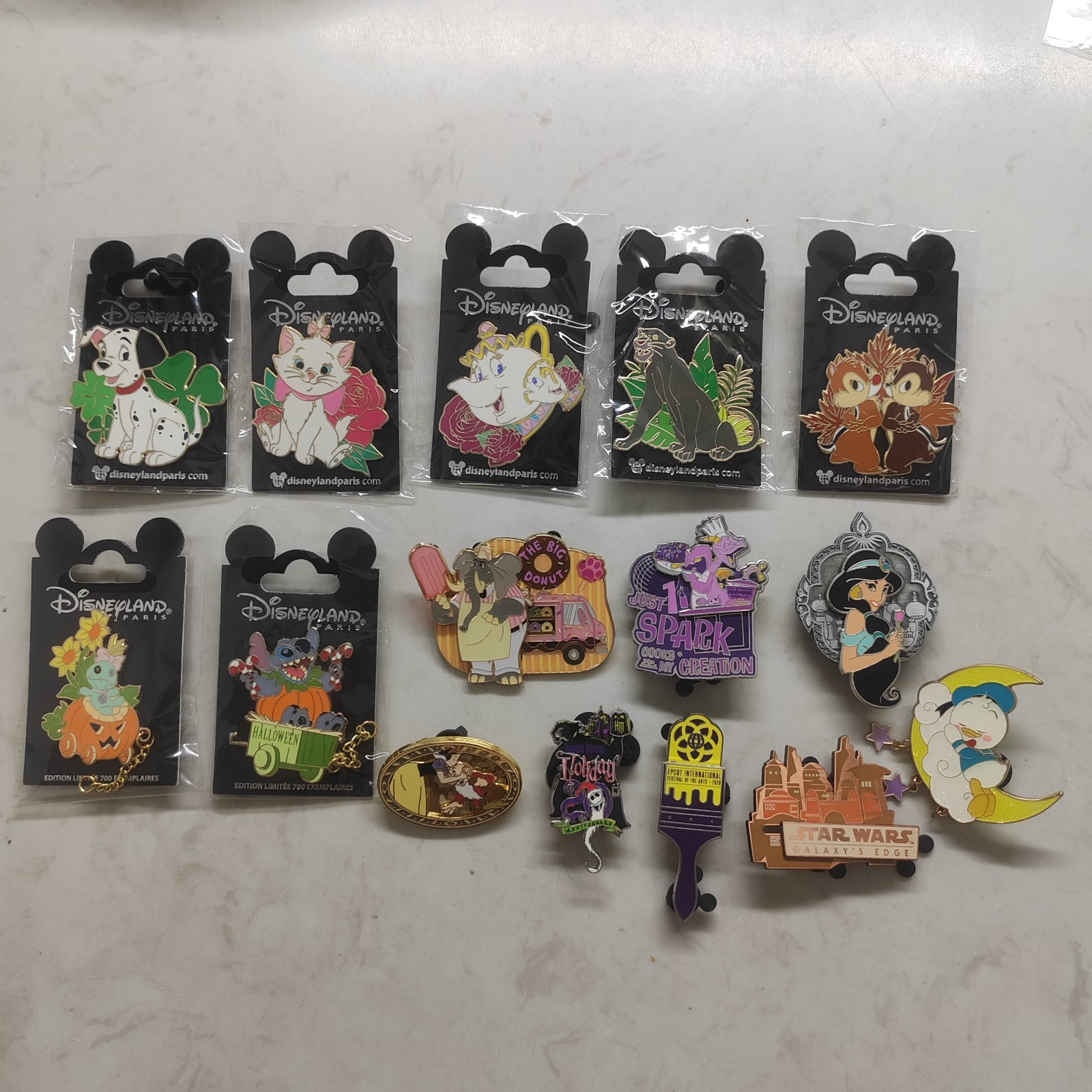 Disney exchange badges come in groups of 15 pins
