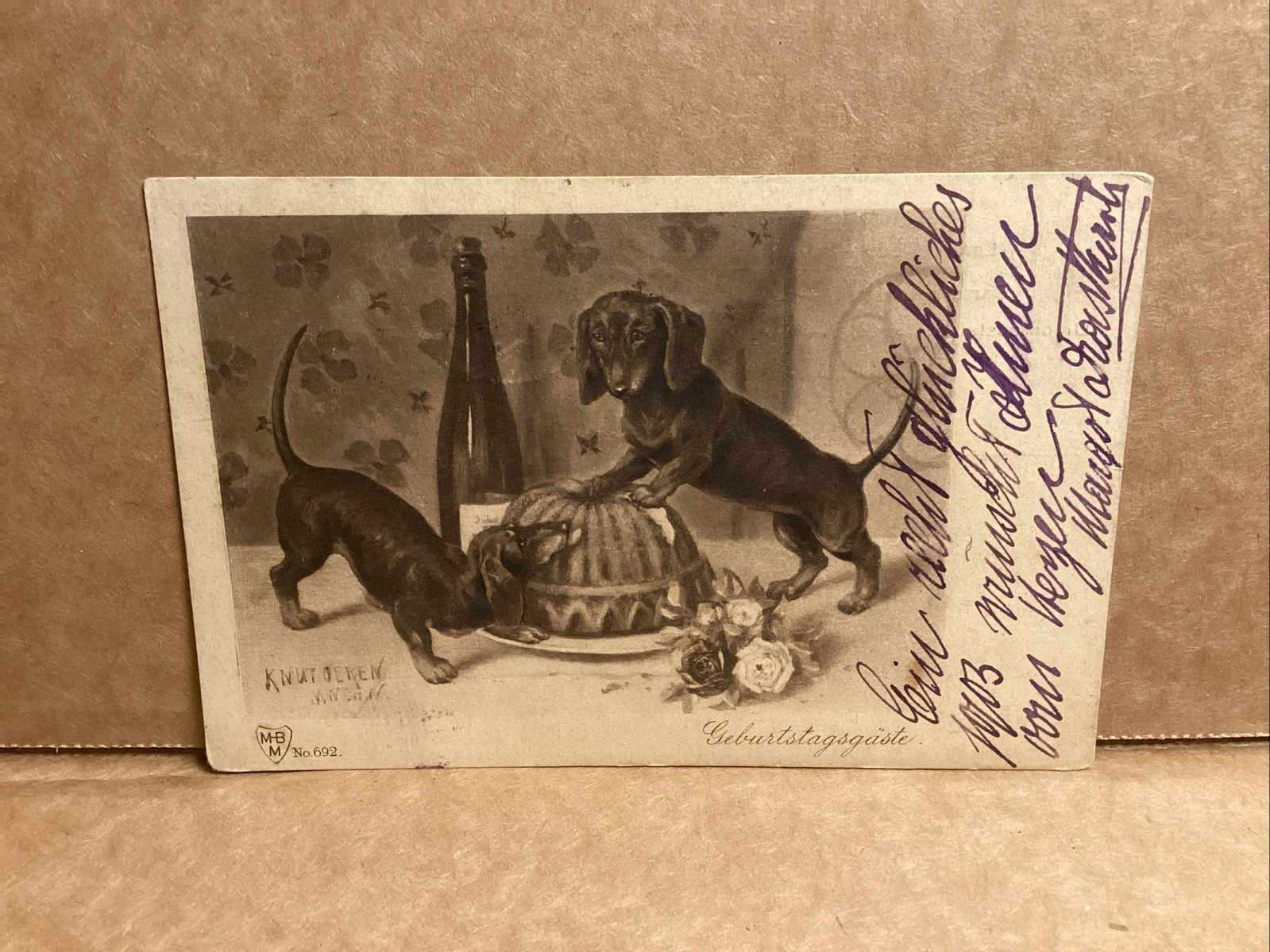 Antique C. 1900 Postcard German naughty Dachshund artist playing W Food On Table