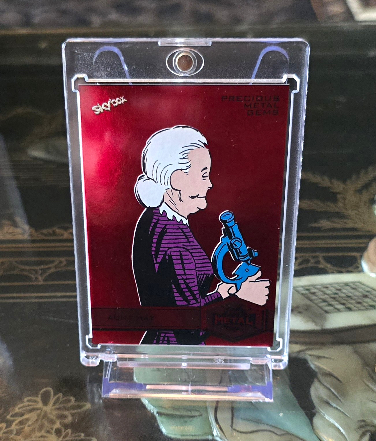 2021 SkyBox Metal Universe Precious Metal Gems Aunt May #106 027/100