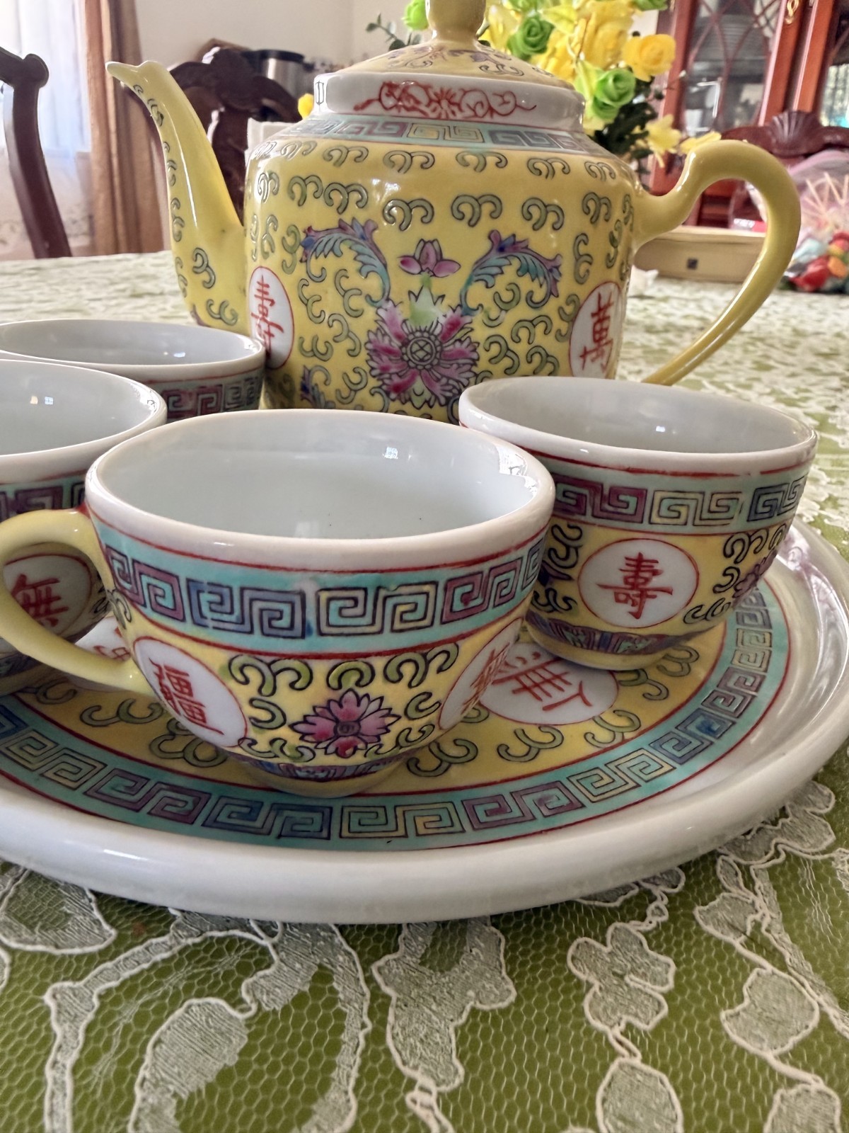 Yellow porcelain Mon Shou Chinese Longevity Teapot, Four cups and Plate Yellow porcelain Mon Shou Chinese Longevity Teapot, Four cups and Plate