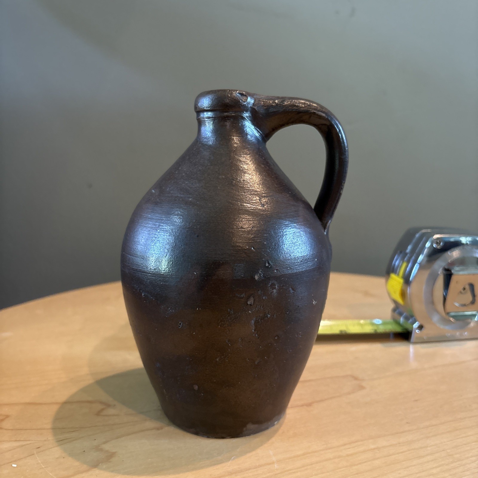 antique American brown glazed stoneware ovoid jug w/ handle