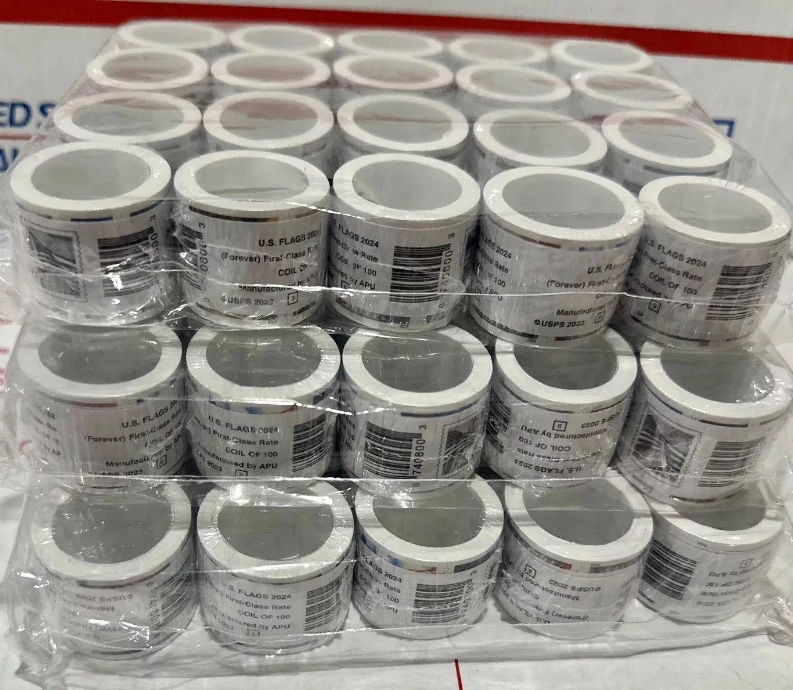 10 rolls of 100 USPS postage stamps, totaling 1000 pieces