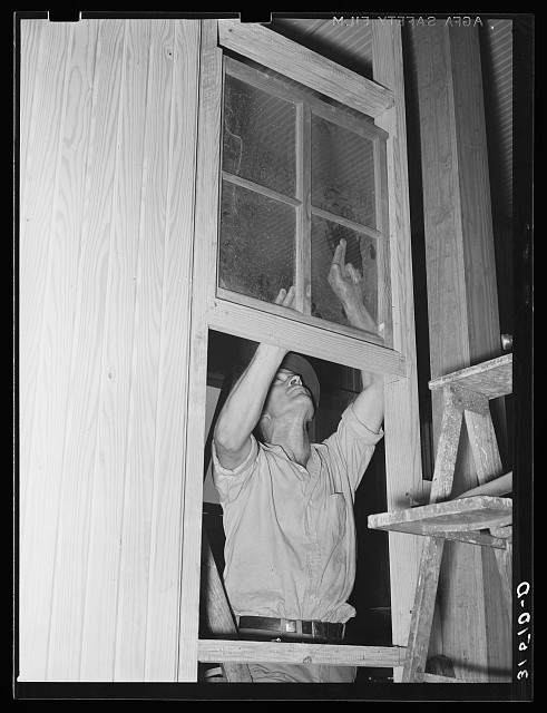 Lake Dick Arkansas 1938 Cooperative Member Installing Window in General Store