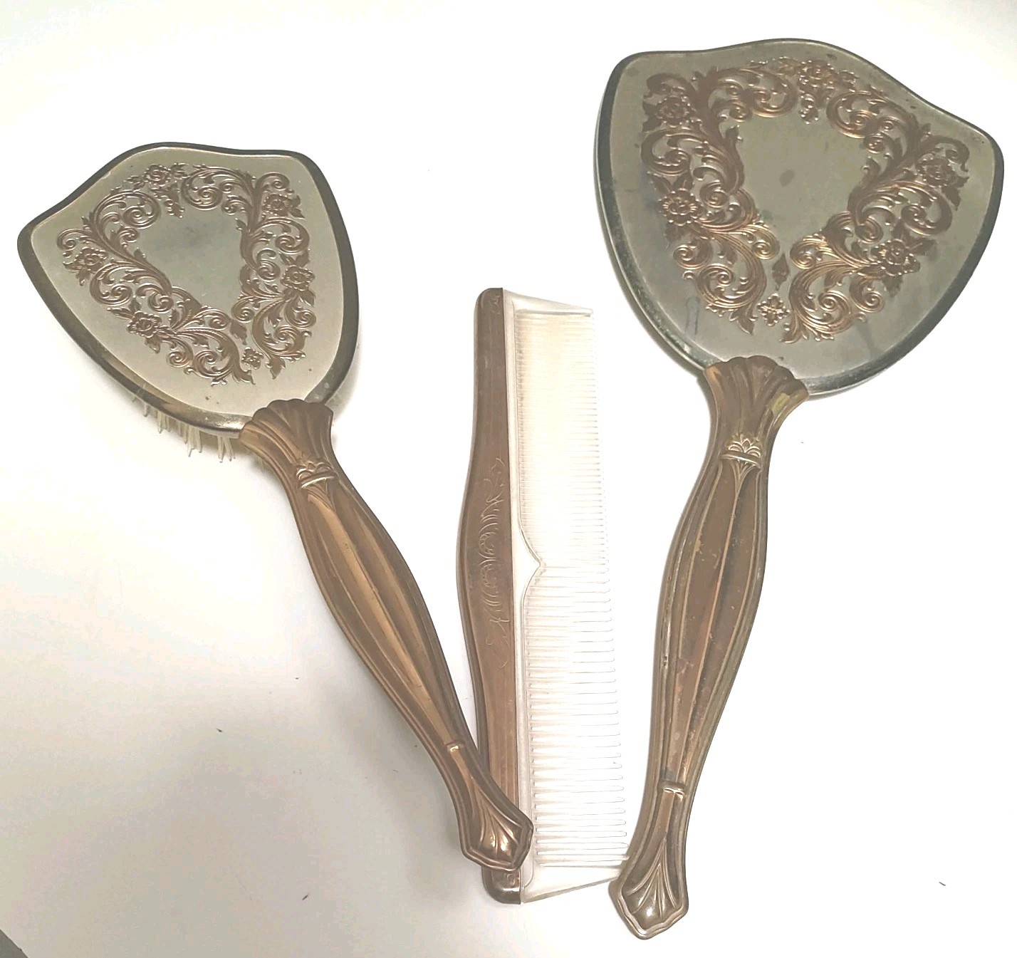 Vintage Vanity Set-Hand Mirror, Hair Brush and Comb Gold plate trim and handle.