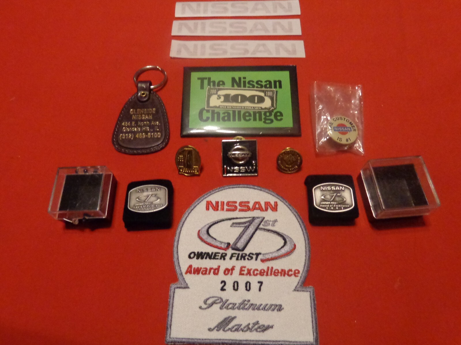 VINTAGE 12 PIECE NISSAN MOTORS ADVERTISING & EMPLOYEE AWARDS-  NEVER USED  # 501