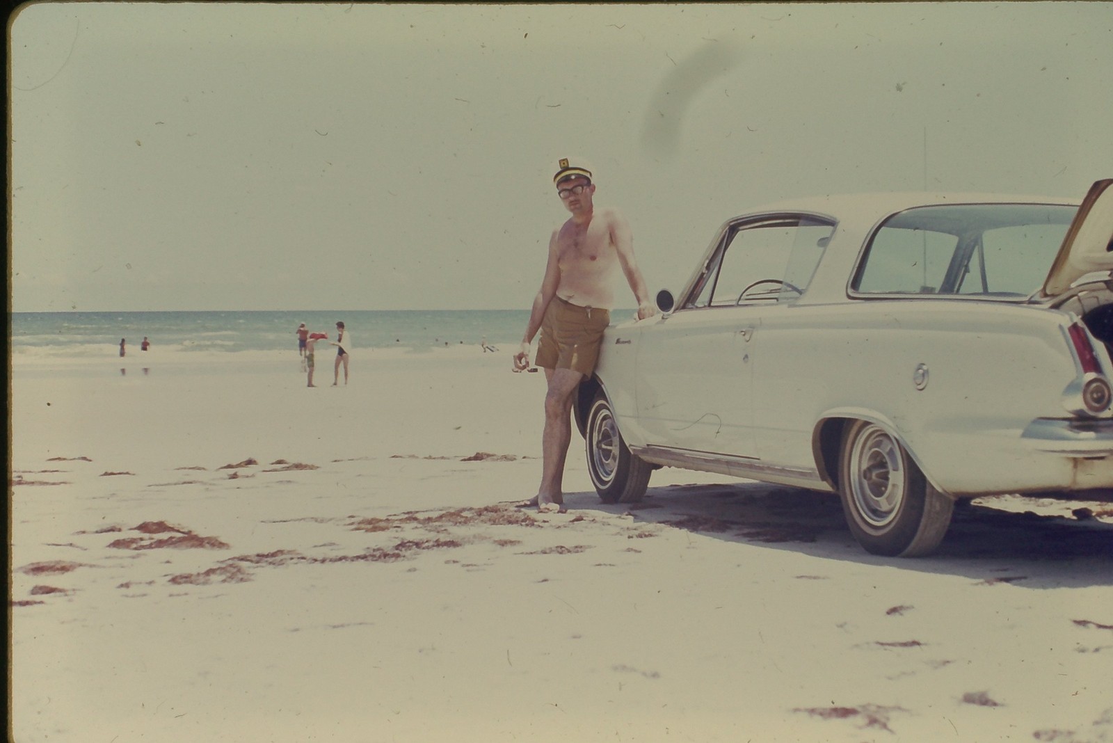 c1960\'s Agfachrome 35mm Slide Man Plymouth Barracuda Beach Ocean USA Car Window