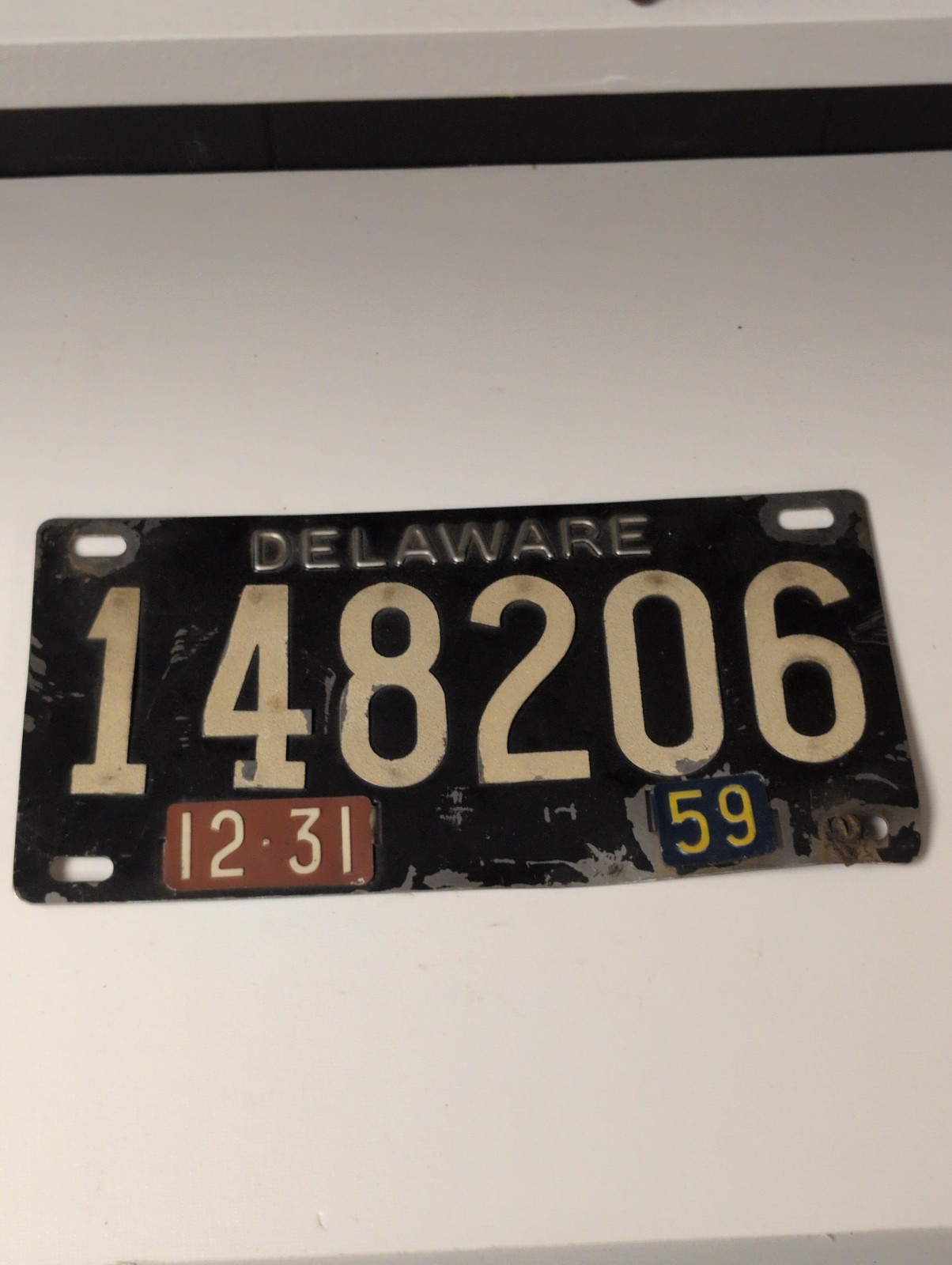 1959 Delaware License Plate Riveted DE Black Steel Tag Reflective 148206