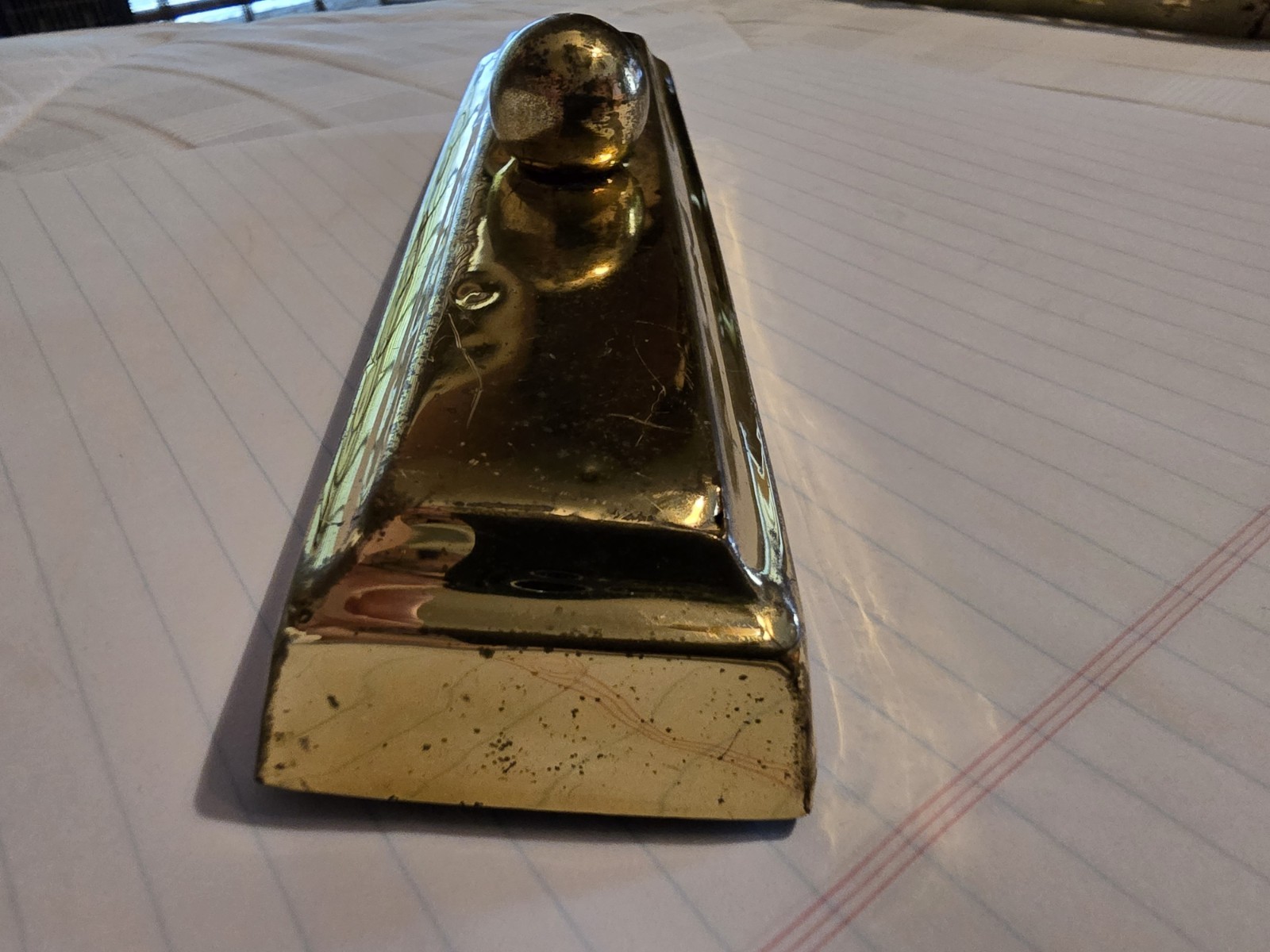 ANTIQUE VINTAGE BRASS OVER CAST IRON PAPERWEIGHT BUTTER STICK INGOT BRICK BLOCK.