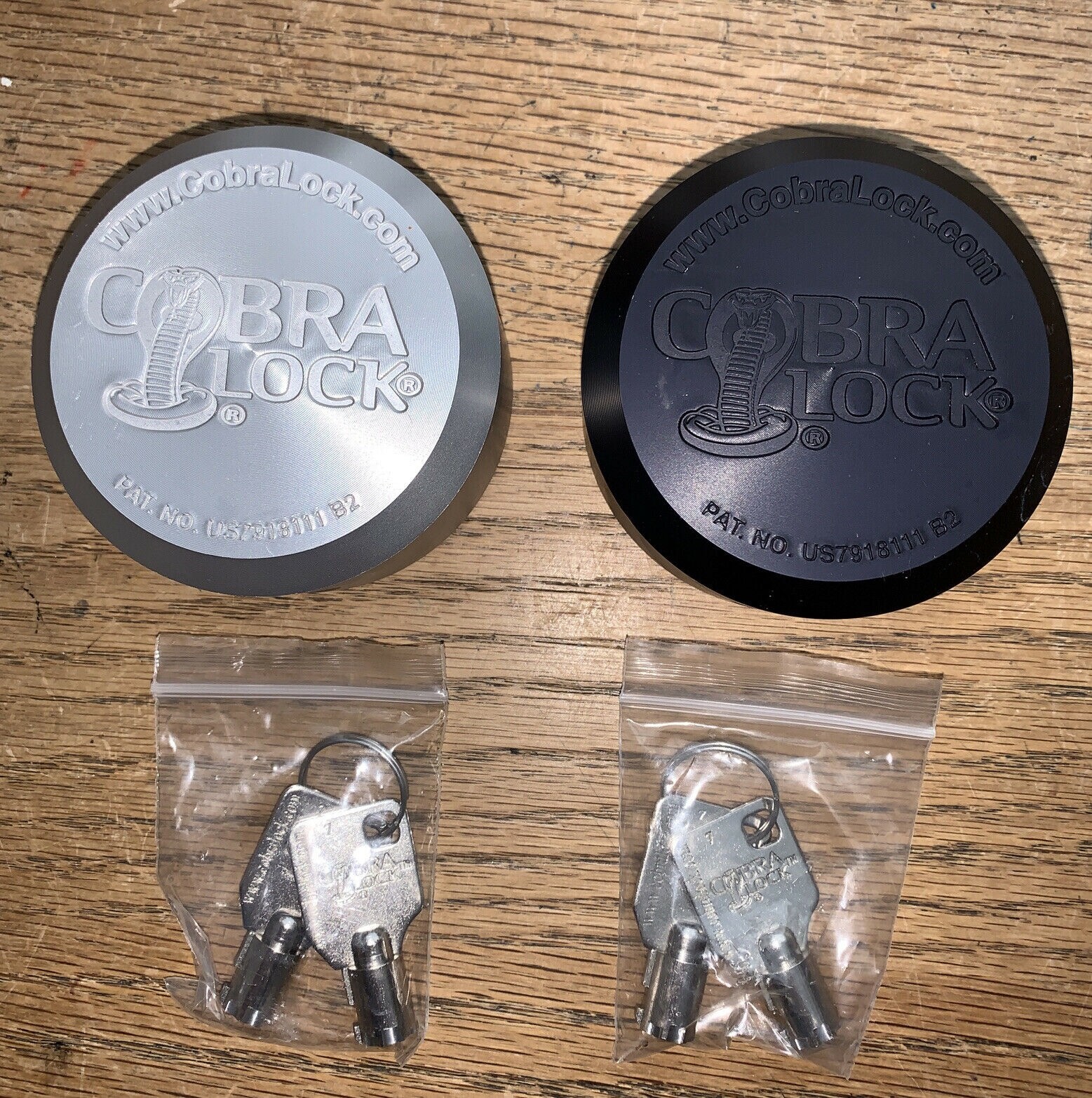(2) COBRA HIDDEN SHACKLE  PUCK LOCKS \