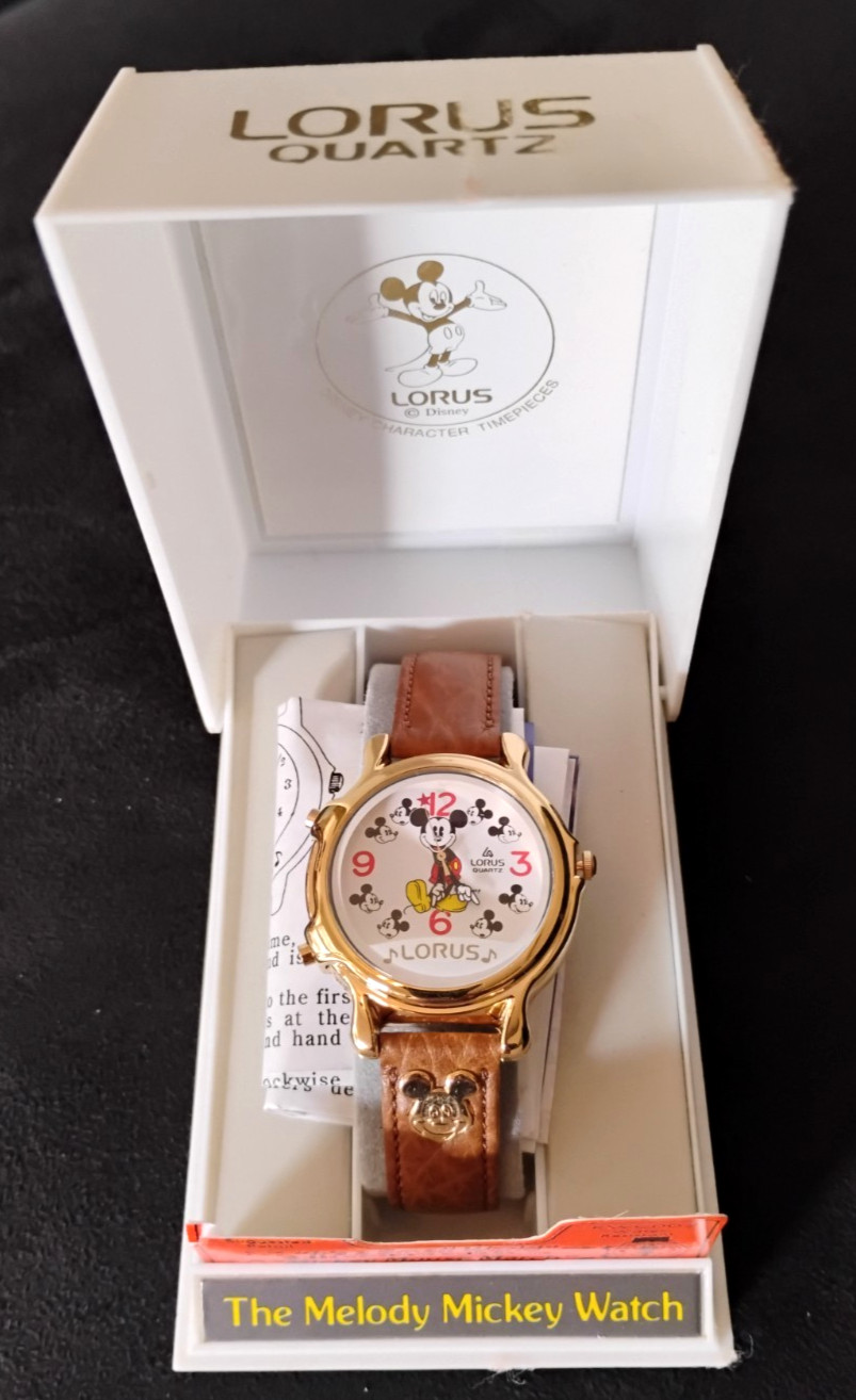 Vintage Lorus Disney Mickey Mouse It’s a Small World Musical Watch Brown New