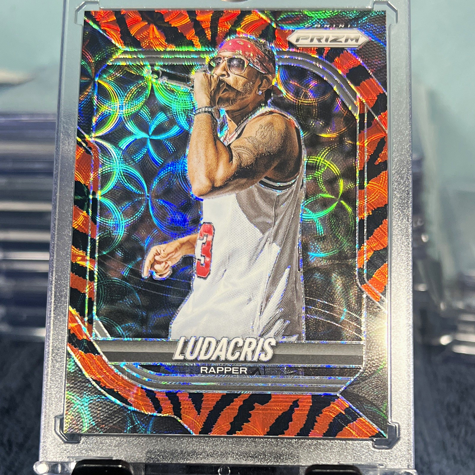 Panini 2025-26 Prizm Basketball #136 Ludacris Tiger Stripe Parallel