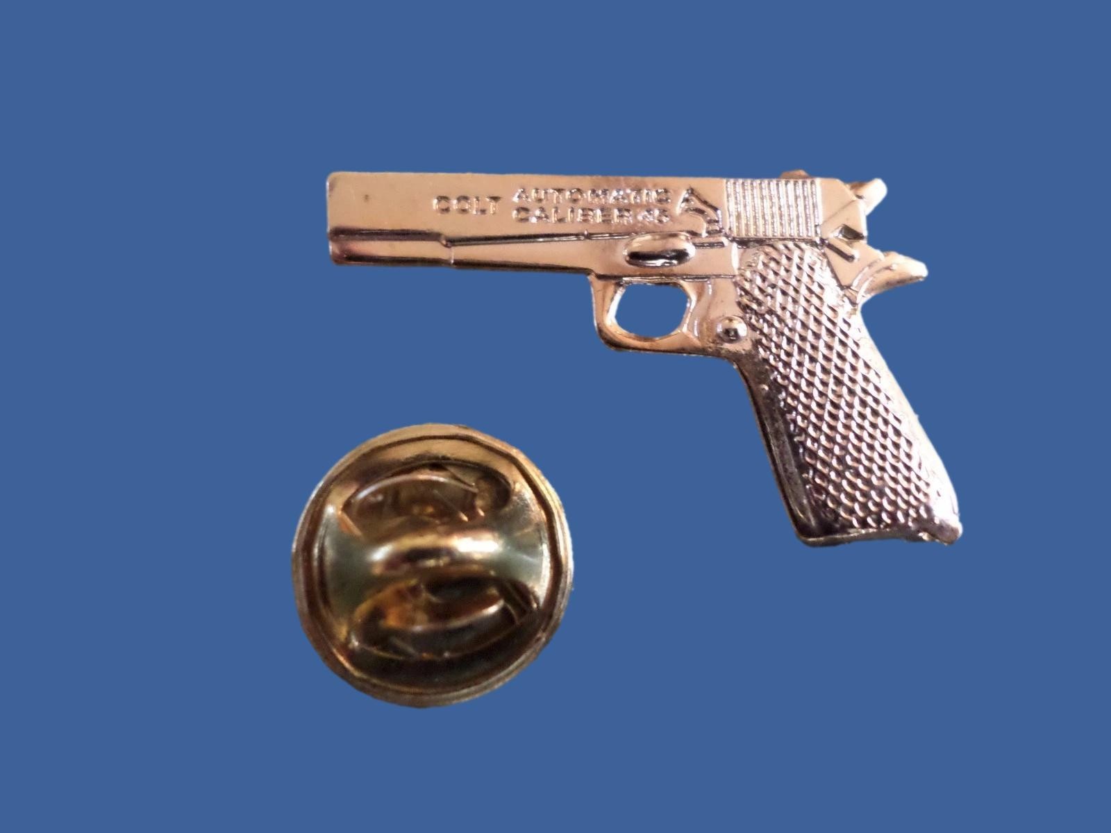 COLT 45 AUTOMATIC PISTOL HAT PIN LAPEL PIN GOLD IN COLOR COLT 45 AUTOMATIC PISTOL HAT PIN LAPEL PIN GOLD IN COLOR