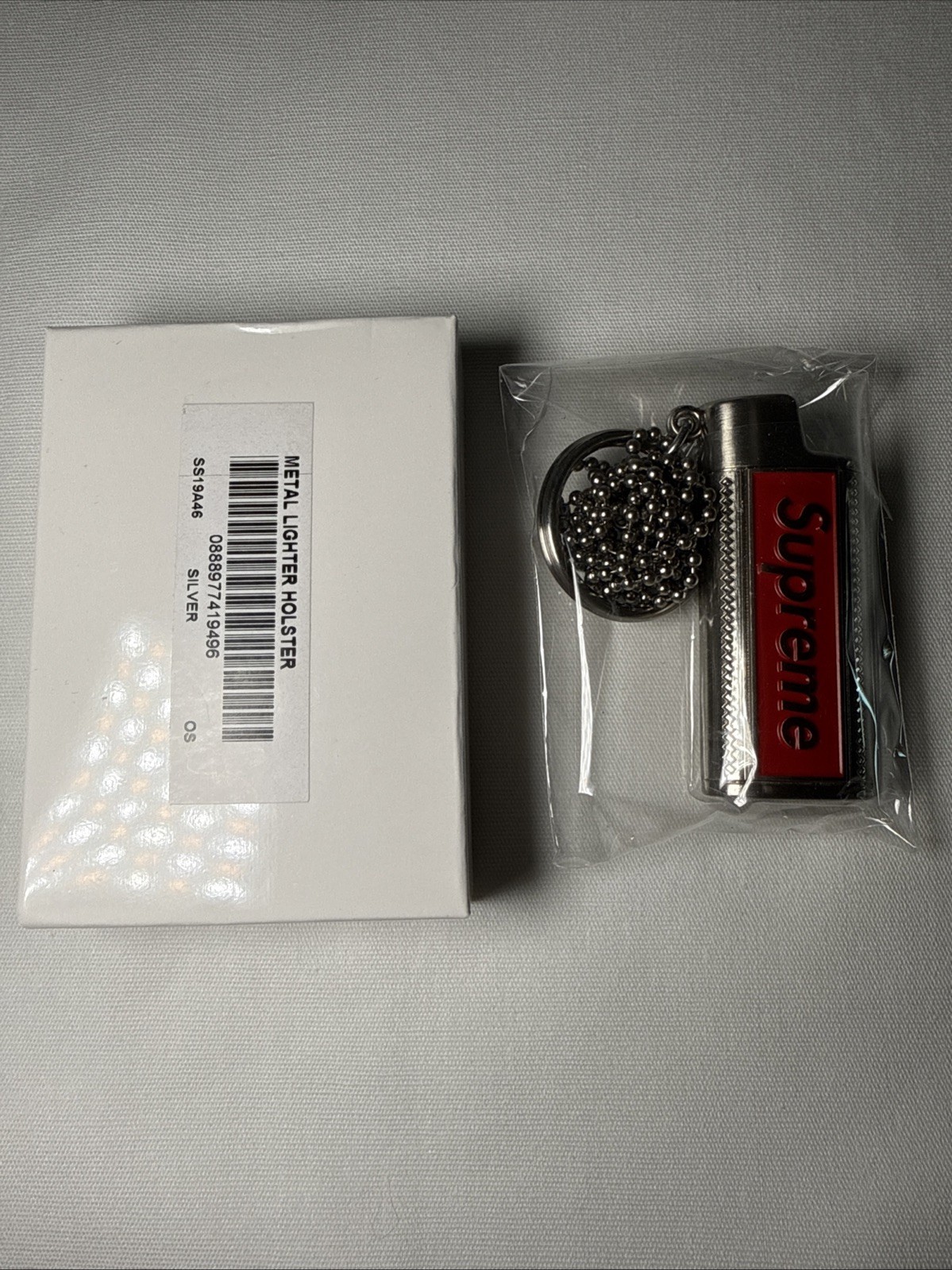 SS19 Supreme Metal Lighter Holster Logo Lighter Holder Silver Red NIB SS19 Supreme Metal Lighter Holster Logo Lighter Holder Silver Red NIB