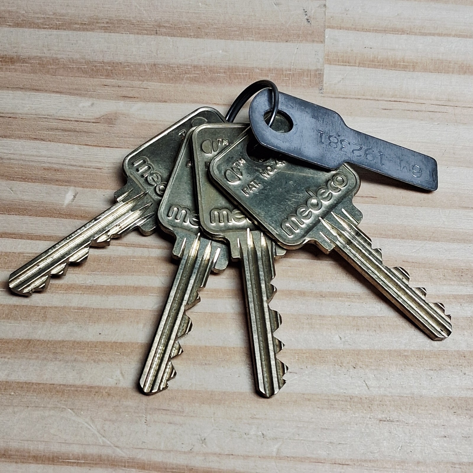 Four Medeco Restricted Do Not Duplicate Cut Keys with Numbers Tag