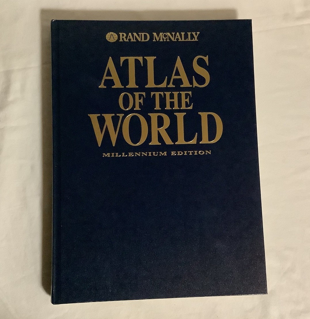Vintage 2000 Rand McNally Millennium World Atlas EUC Hardcover.