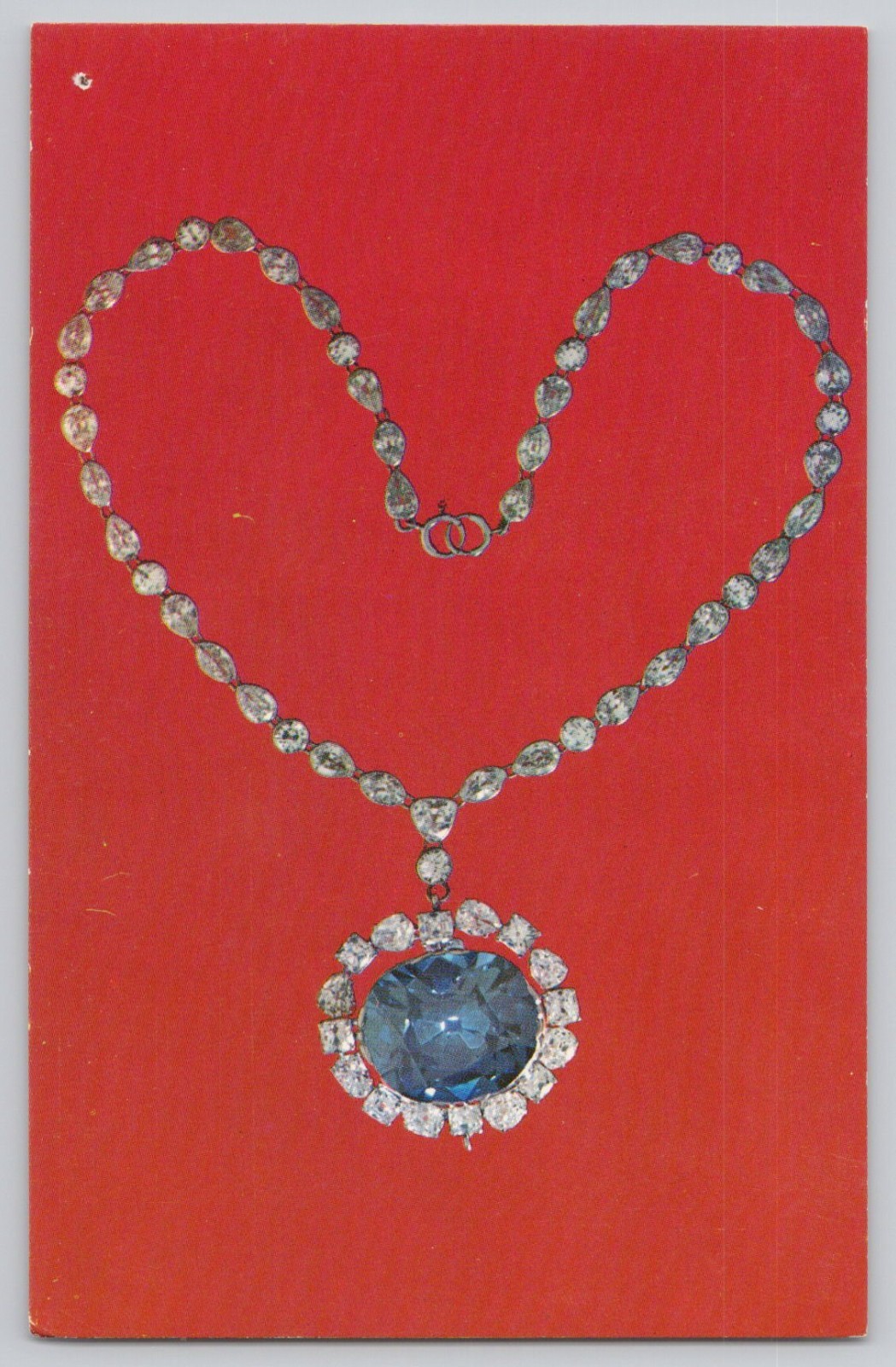 Hope Diamond Necklace Smithsonian Exhibit Red Background c1950s POSTCARD