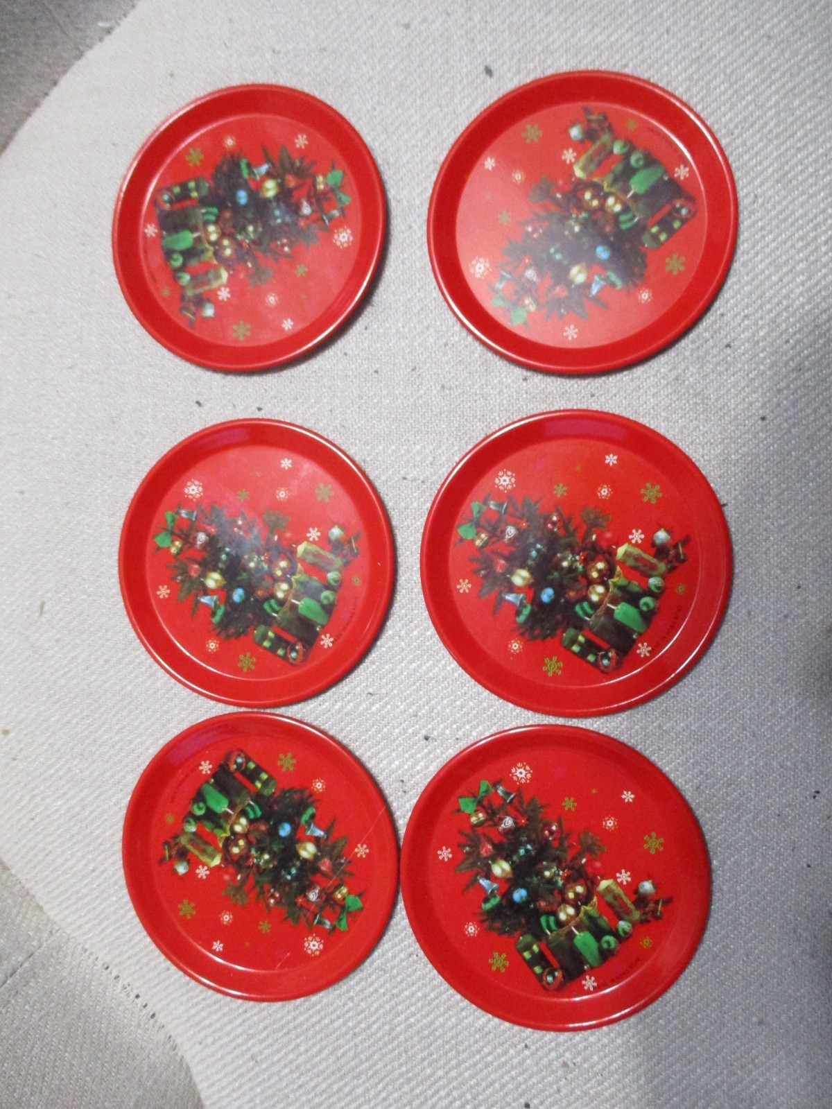 Vintage Metal Tin Red Christmas Coasters w/ Christmas Tree Hong Kong lot of 6