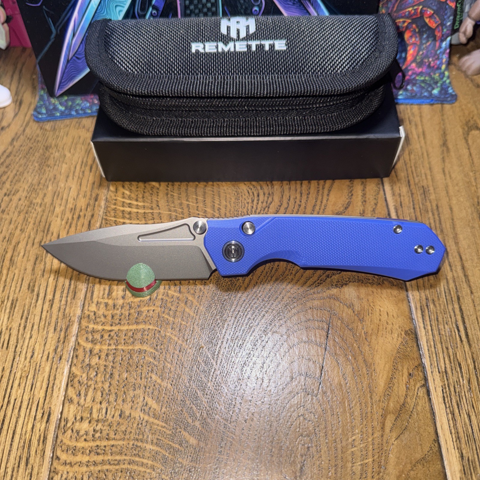 REMETTE RT-Rhino Blue RNGD4 G10 Scales. D2 Blade. Button/liner Lock Thumb Stud