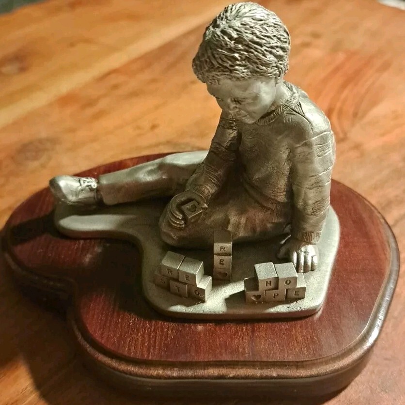BETHANY CHRISTIAN SERVICES RESTORE HOPE PEWTER BOY W/ BLOCKS PAPERWEIGHT BETHANY CHRISTIAN SERVICES RESTORE HOPE PEWTER BOY W/ BLOCKS PAPERWEIGHT