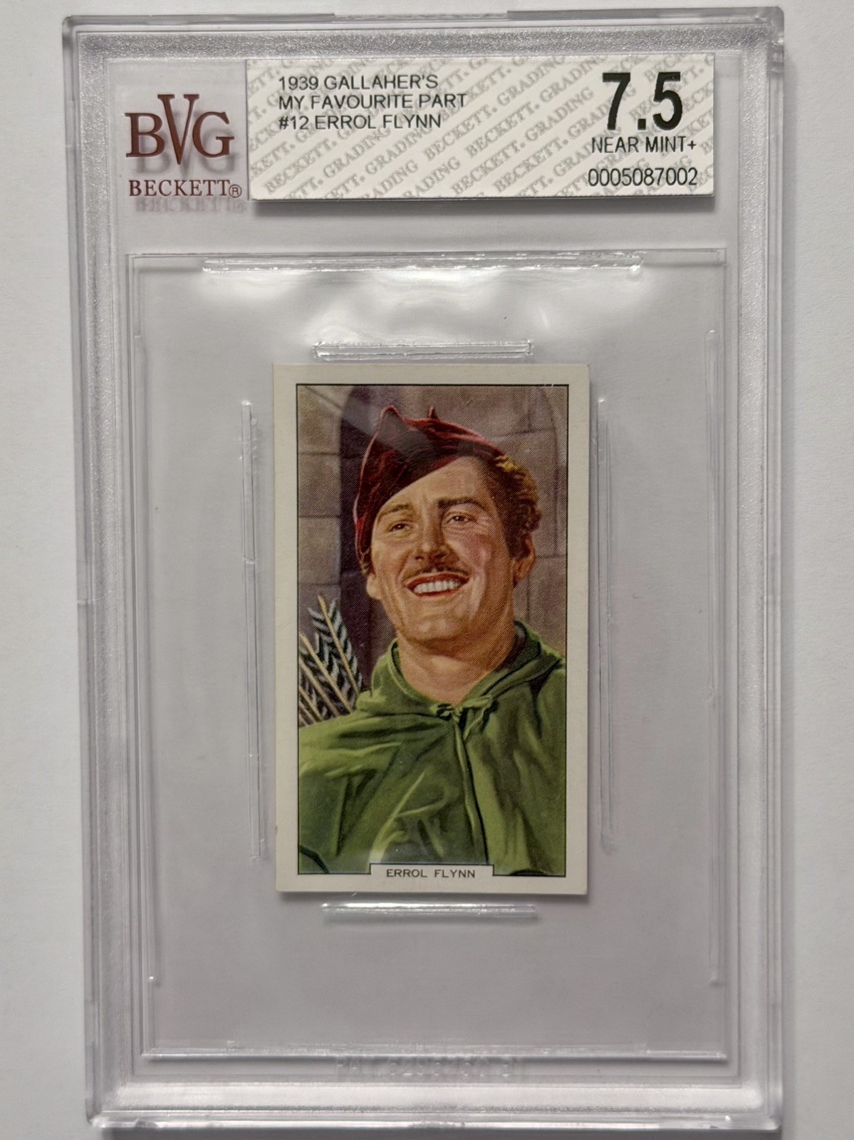 1939 Gallaher’s “My Favourite Part” #12 Errol Flynn BVG 7.5 NM+ Robin Hood 1939 Gallaher’s “My Favourite Part” #12 Errol Flynn BVG 7.5 NM+ Robin Hood