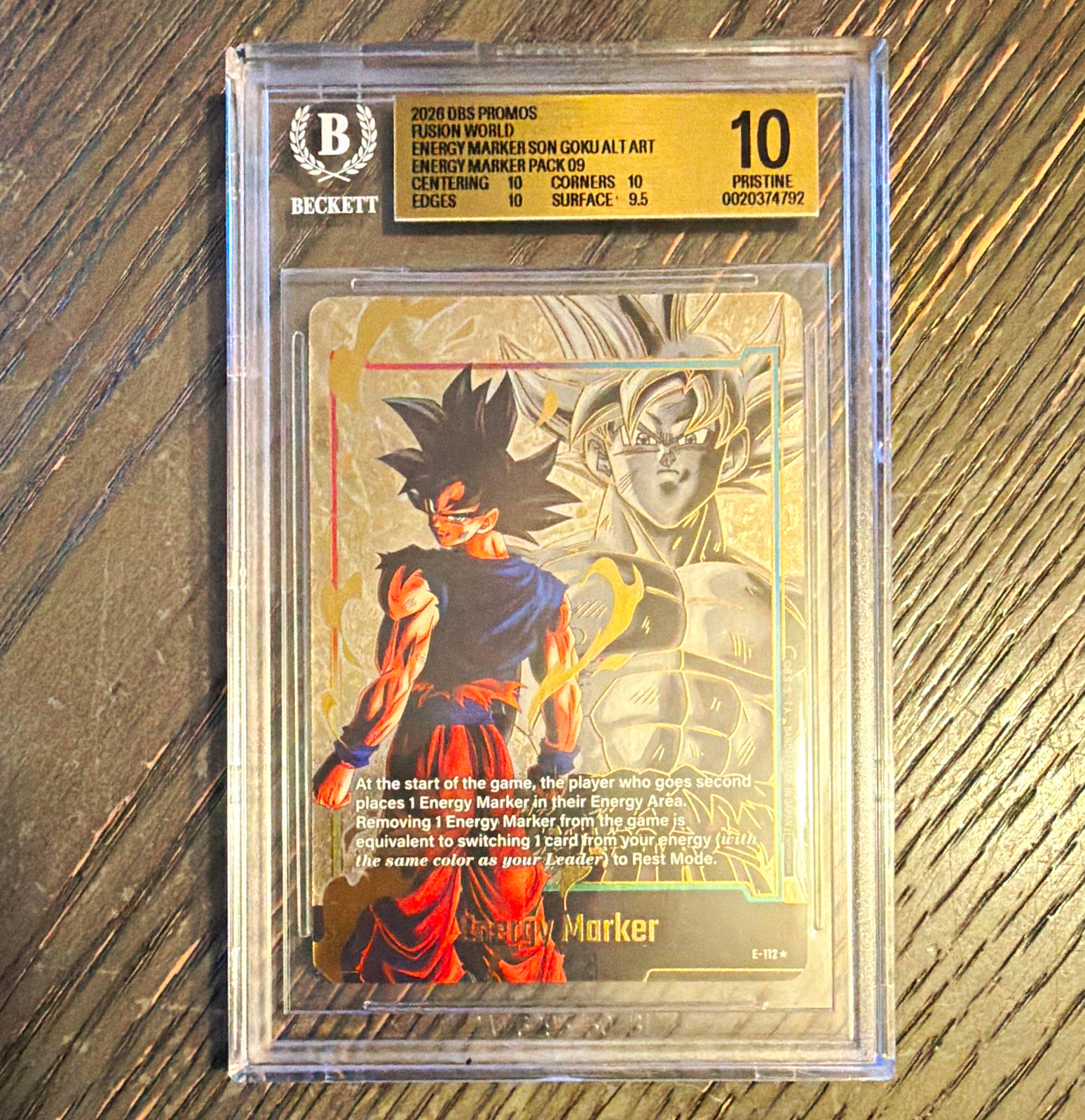 Dragon Ball Fusion World Card Game Goku Energy Marker E-112 Gold Alt BGS 10