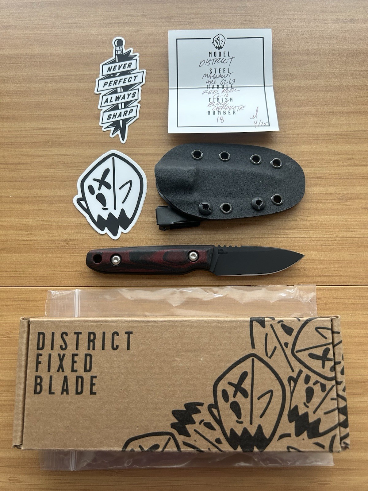 OEG EDC District Fixed Blade 1 of 1 - Red Burl G10 - Black Cerakote MagnaCut OEG EDC District Fixed Blade 1 of 1 - Red Burl G10 - Black Cerakote MagnaCut