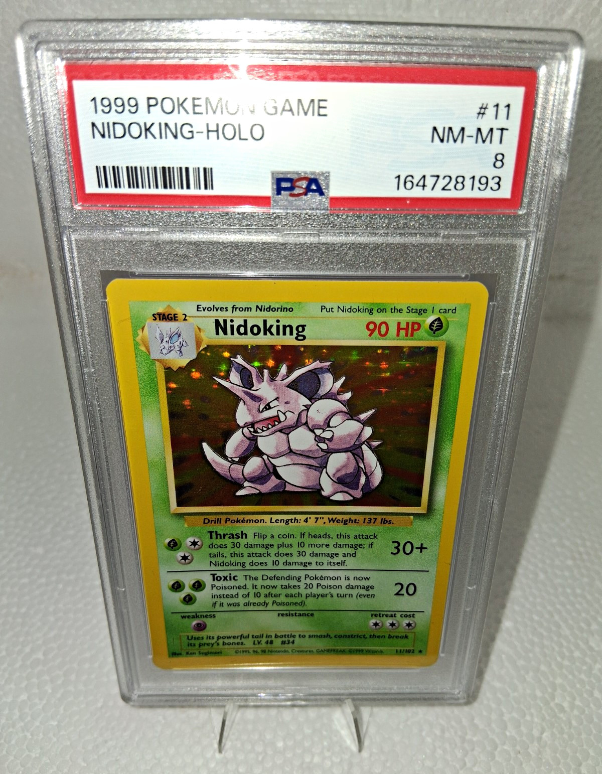 Pokemon 1999 Pokemon Game Nidoking Holo #11 PSA 8 Cert 164728193