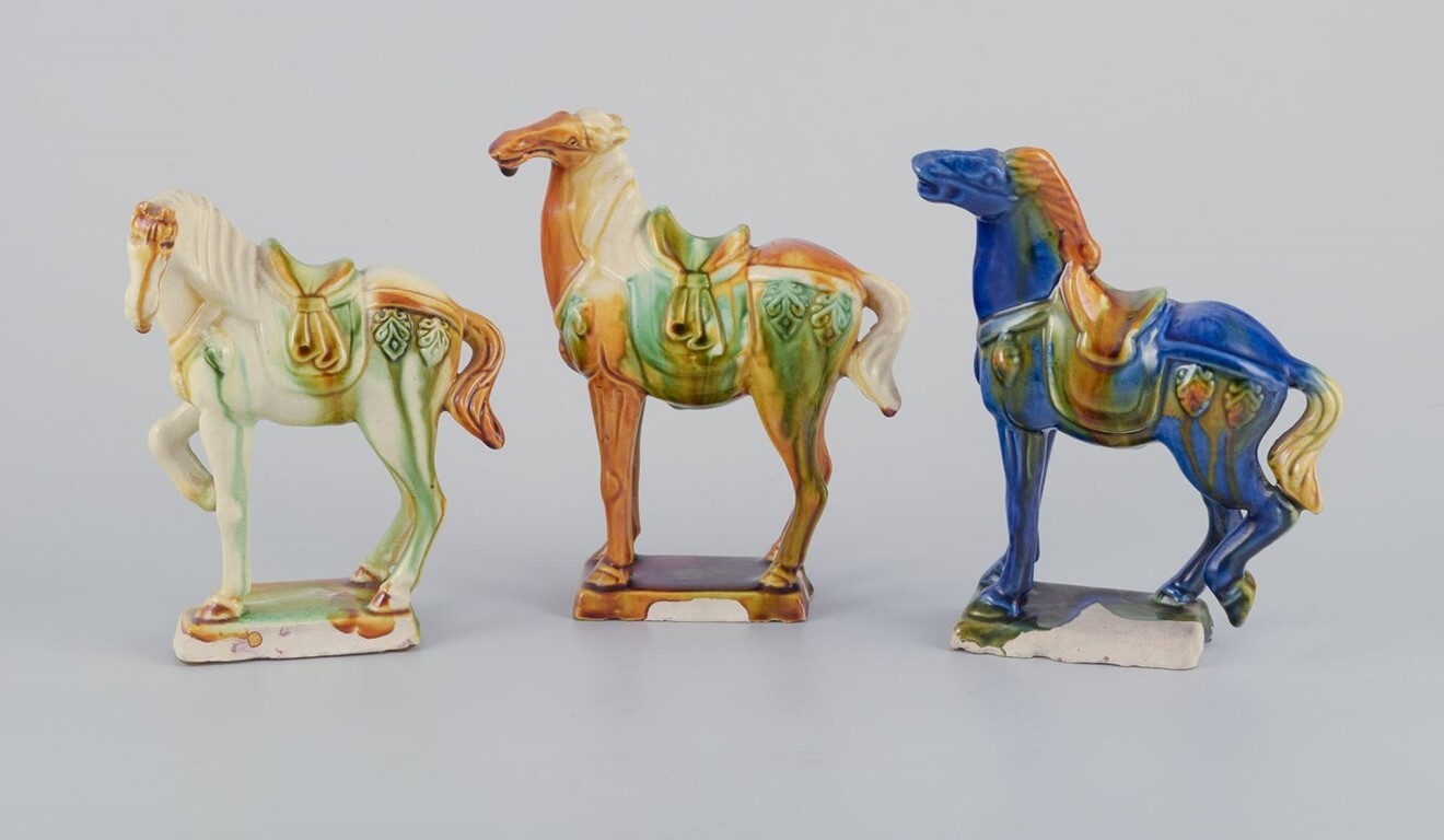 Three Chinese Tang horses in earthenware. Approx. 1930s Three Chinese Tang horses in earthenware. Approx. 1930s