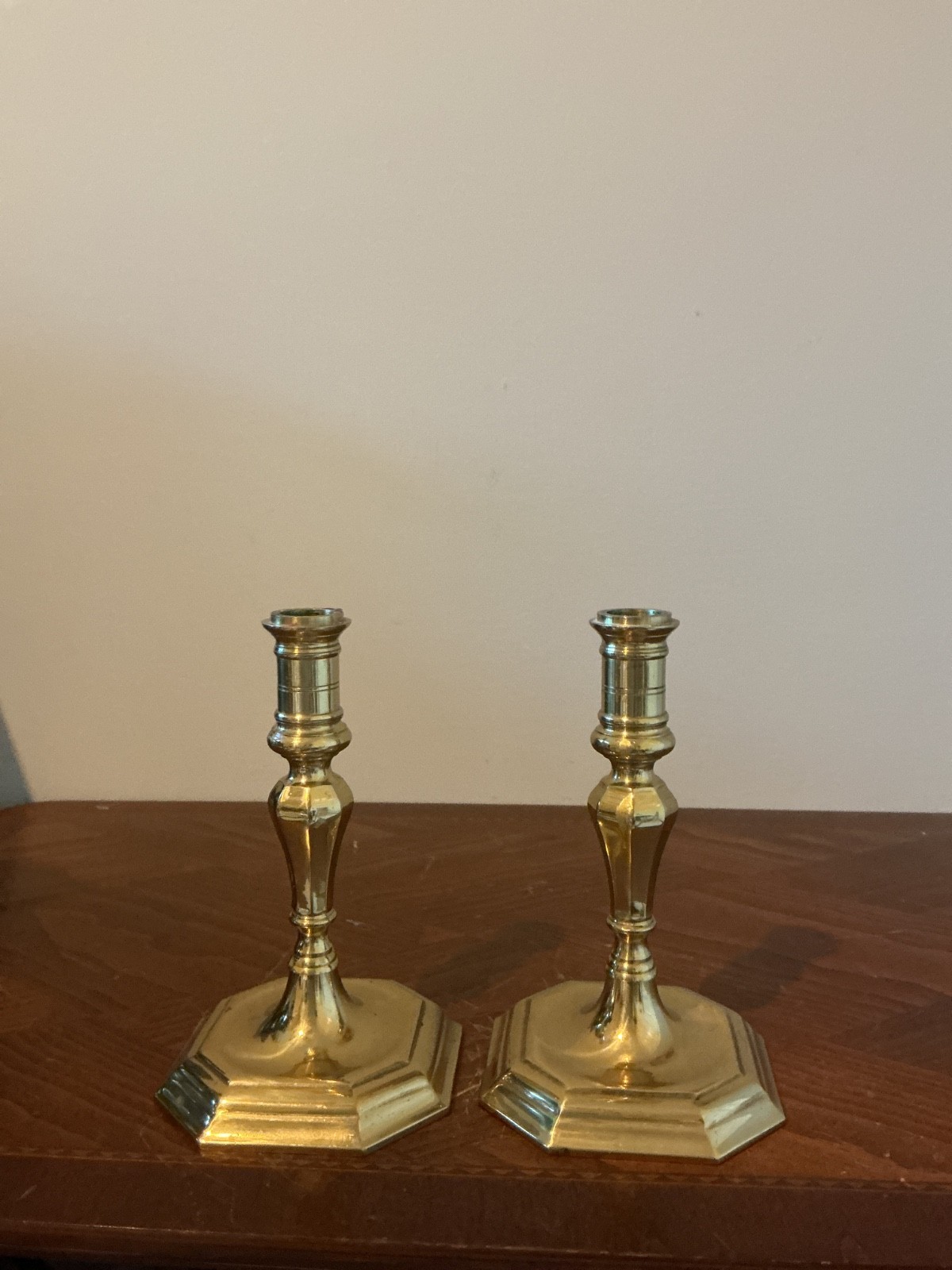 pair of vintage 7-inch solid brass candlesticks with octagonal bases, closely re pair of vintage 7-inch solid brass candlesticks with octagonal bases, closely re